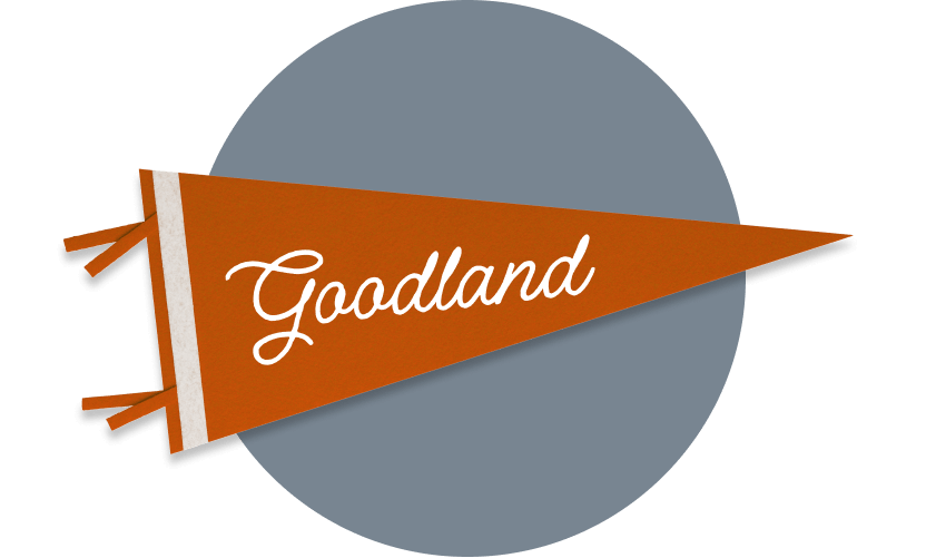 Brown and orange pennant with the word "goodland" on a grey background, symbolizing new home communities in Mansfield TX.