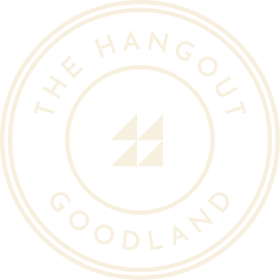 Black-and-white logo for "the hangout goodland" featuring a central diamond shape enclosed within two concentric circles, representing the new homes in Goodland TX.