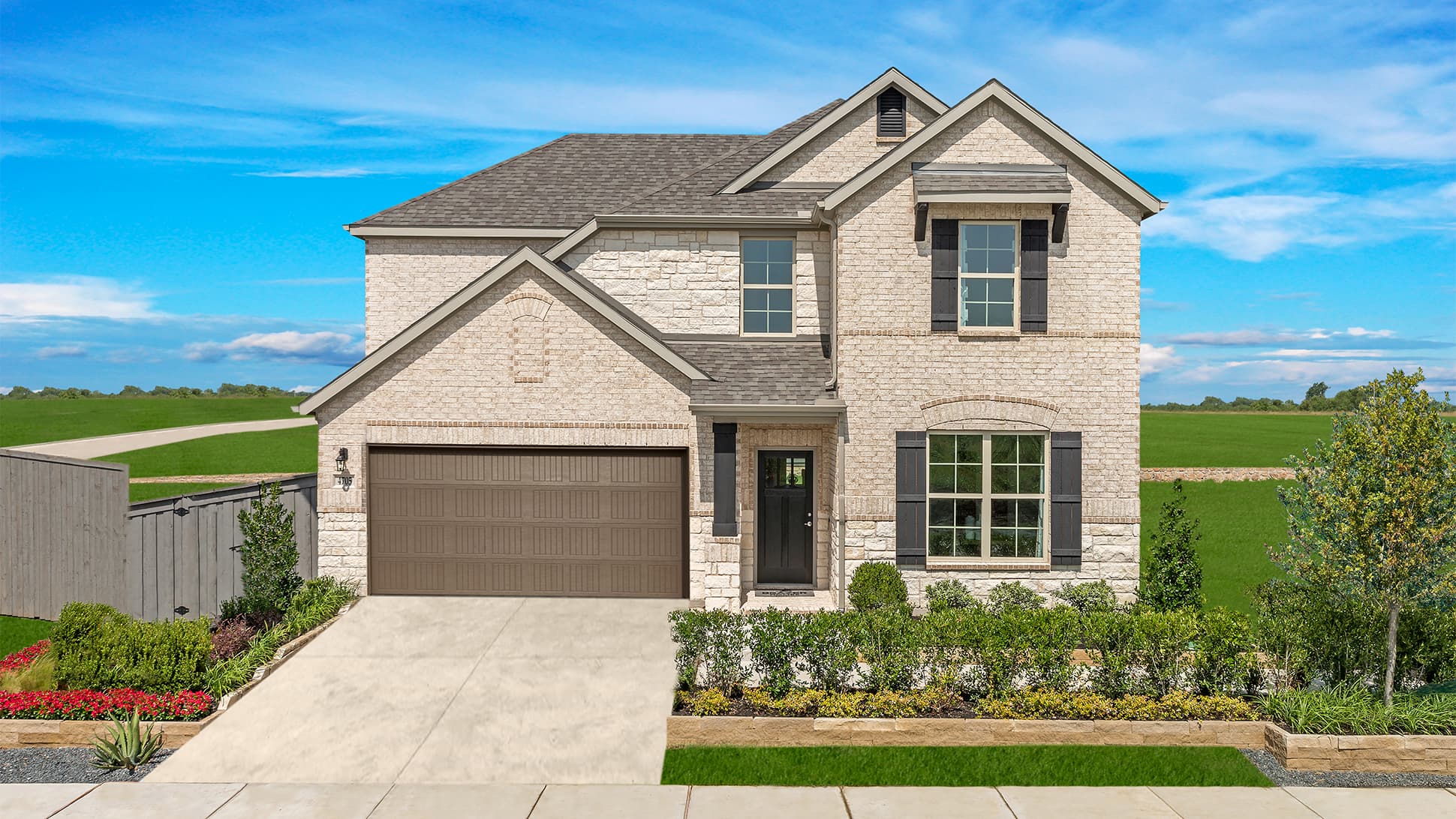 New two-story suburban house in Mansfield, TX with brick facade and landscaped front yard.