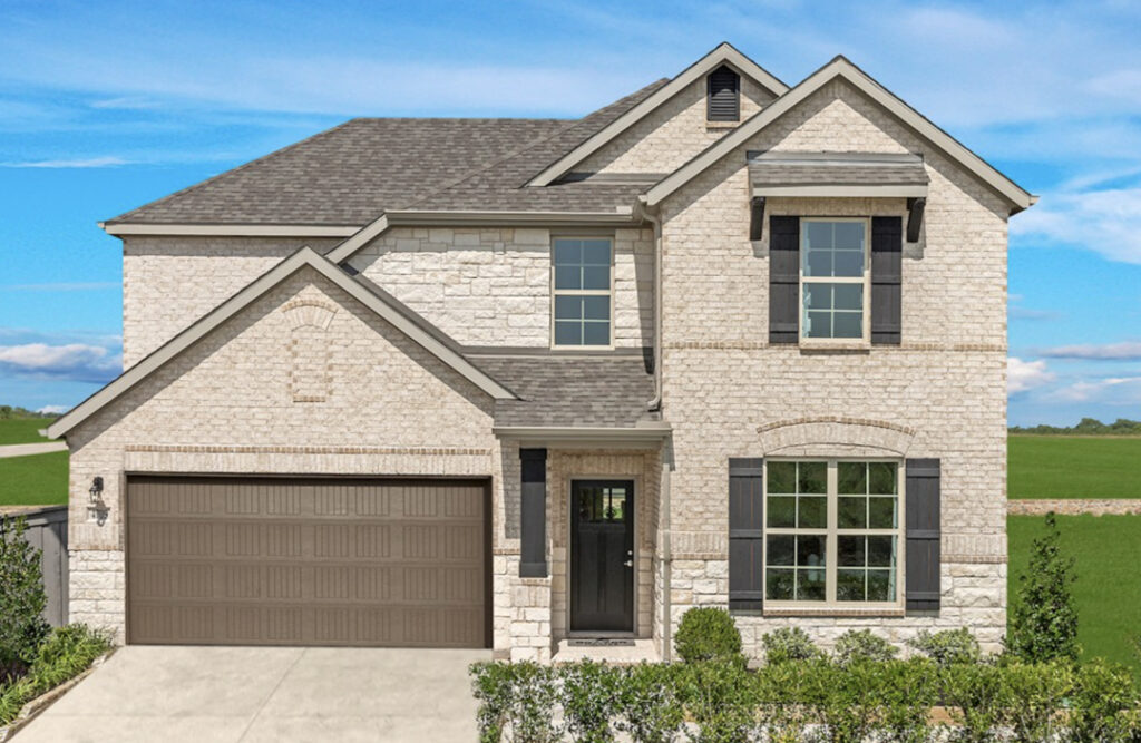 Two-story suburban home with stone facade and attached garage, among the new homes in Mansfield TX.