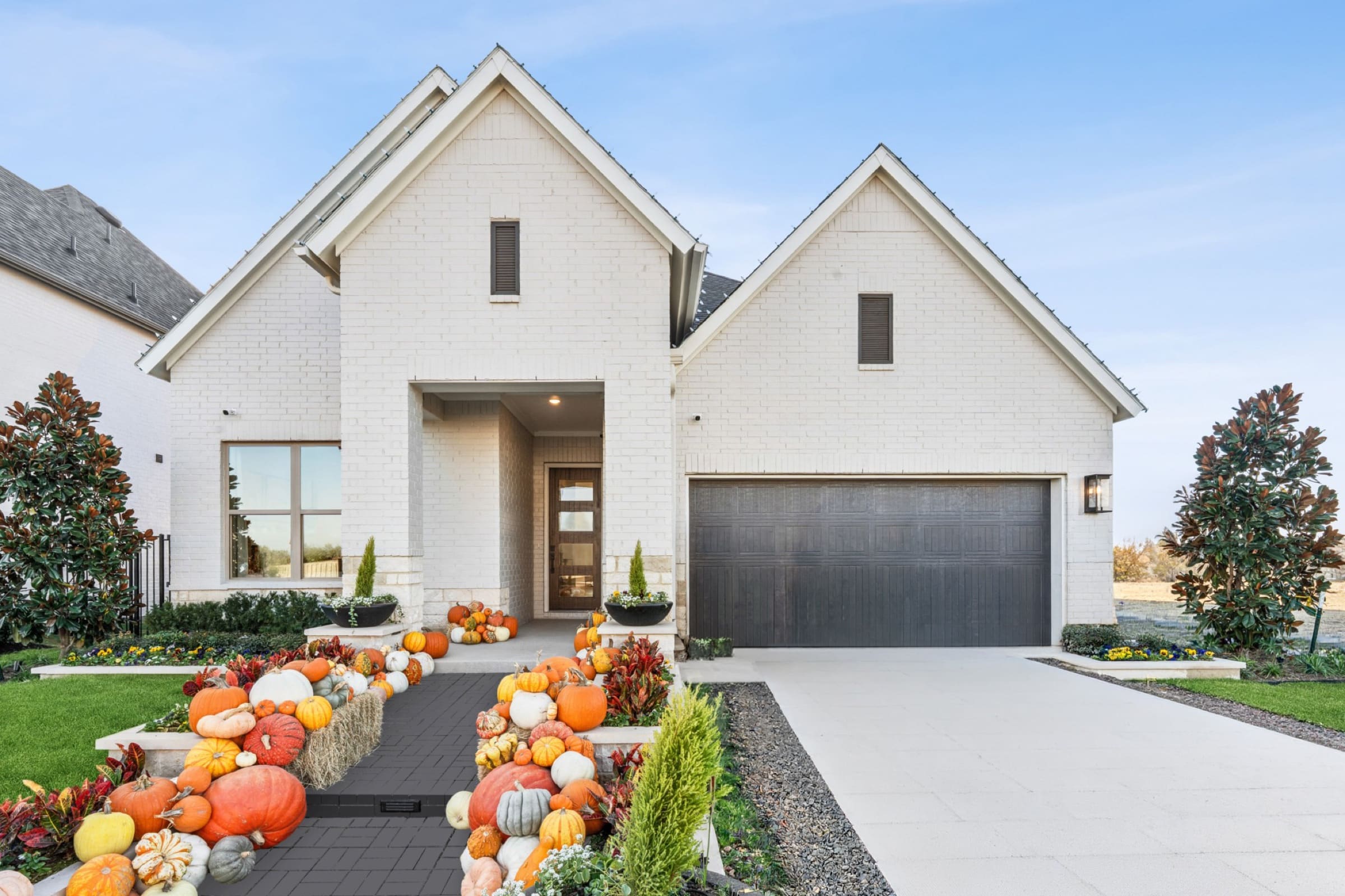 A Goodland model home exterior decorated for fall